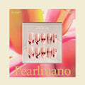 Cheri red and pink floral French tip oval press-on nails